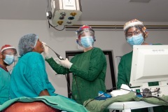 At ear centre-PPE usage while assesing the patient-3