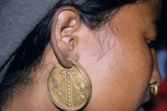 Traditional heavy jewellery, R ear lobe.